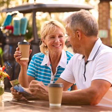 Senior couple smiling at home